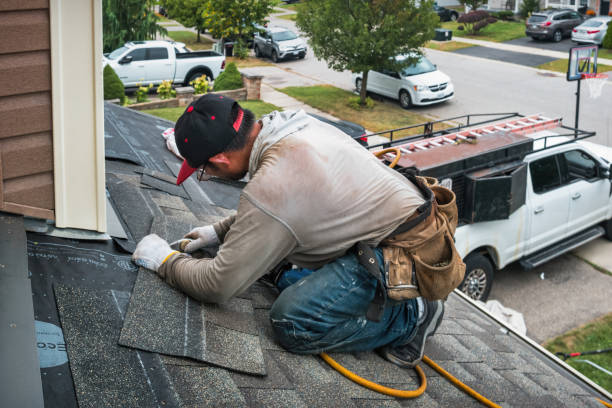 Professional Flat Roof Repair technician working in Woodville, TX